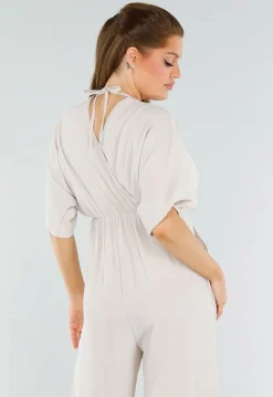 Beige Linnenlook Jumpsuit met Wijde Pijpen en Lage V-Hals