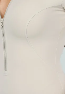Beige Sport Jumpsuit met Korte Mouwen en Rits