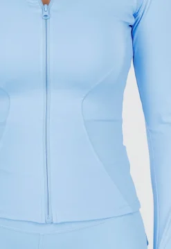 Blauwe Sportset met Scrunch Legging en Vest Cargo Zakjes