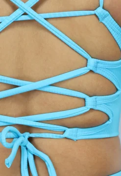 Blauwe Sporttop met Gekruiste Rug en Uitneembare Pads