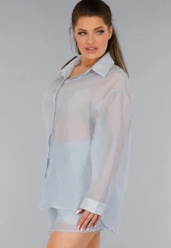 Blauwe Tweedelige Set met Doorschijnende Blouse en Elastische Short