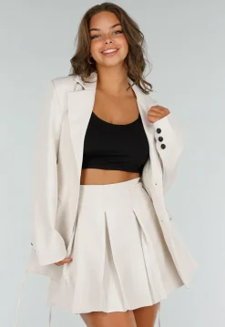 Cremekleurige Tweedelige Set met Blazer met Korsetveter en Plooirok met Ritssluiting