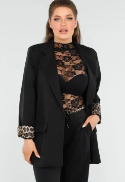 Elegant Zwart Pak met Leopardprint Accenten