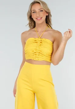 Gele Set met Halter Crop Top en Wijde High Waist Broek