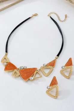 Gouden Sieraden Set met Oranje Driehoek Details en Strass Steentjes