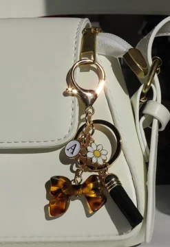 Goudkleurige Tashanger/Sleutelhanger met Leopard Strik, Kralen en Kwastje