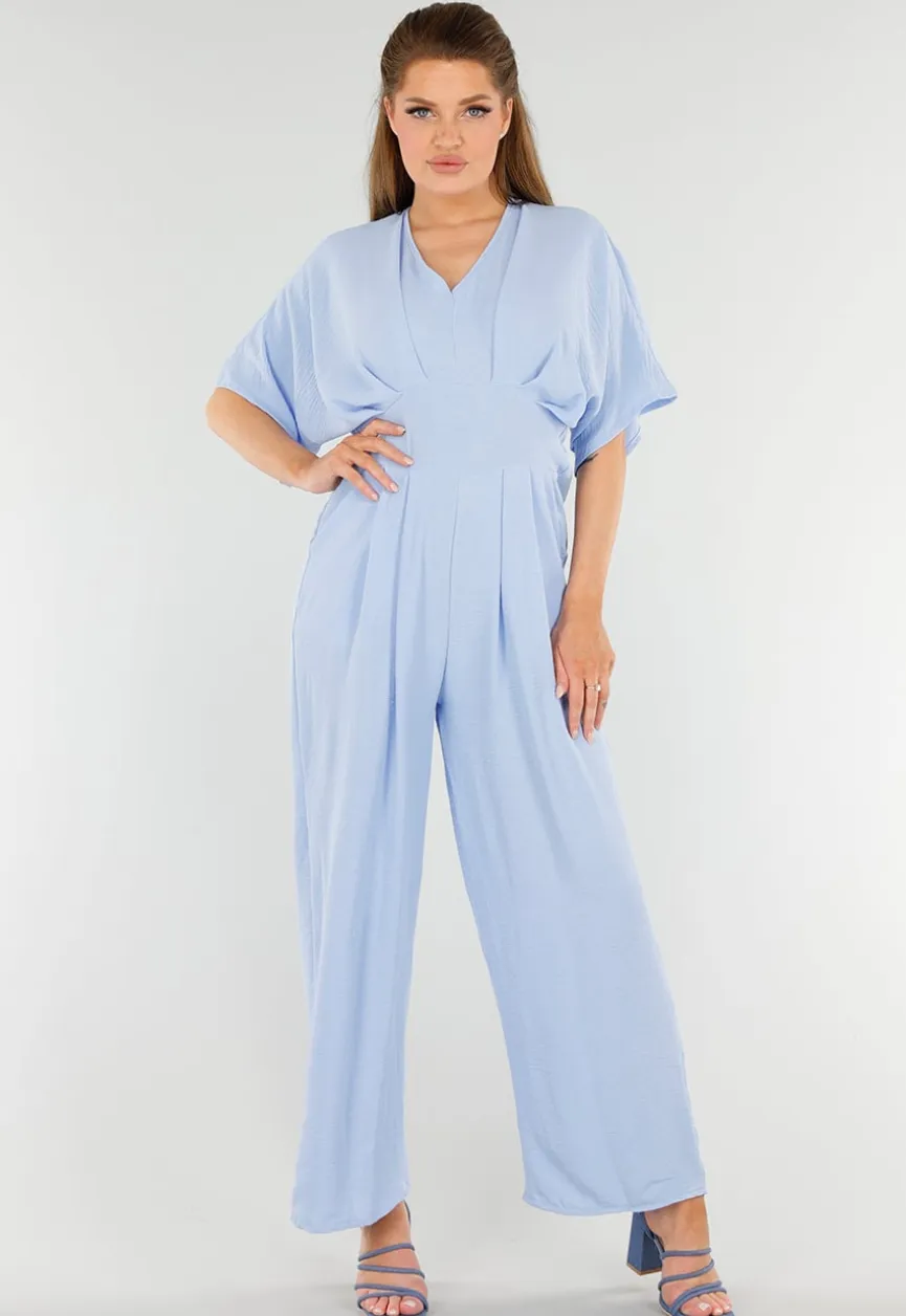 Lichtblauwe Jumpsuit met Wijde Pijpen en Lage V-Hals in Linnenlook