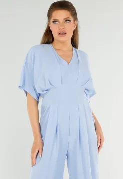 Lichtblauwe Jumpsuit met Wijde Pijpen en Lage V-Hals in Linnenlook