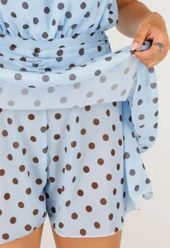 Lichtblauwe Polkadot Playsuit met Halterhals en Volantlaag