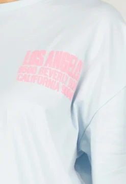 Lichtblauw T-shirt met Roze Print en Korte Mouwen en Ronde Hals