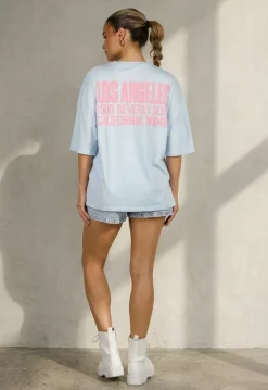 Lichtblauw T-shirt met Roze Print en Korte Mouwen en Ronde Hals