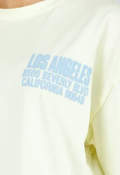 Lichtgeel Oversized T-shirt met Blauwe Tekst en Korte Mouwen
