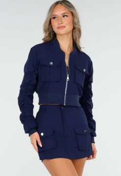 Navy Set met Cropped Bomberjasje en Skort met Zakken