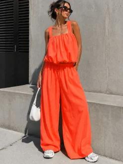Neon Oranje Stretch Two Piece Set met Mouwloze Top en Wide Leg Broek
