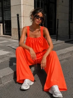 Neon Oranje Stretch Two Piece Set met Mouwloze Top en Wide Leg Broek