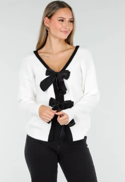 Witte Cardigan met Zwarte Strikken en Lange Mouwen