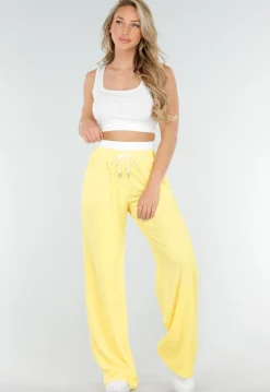 Witte Crop Top en Butter Yellow Wijde Broek Set met Elastische Taille