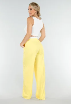 Witte Crop Top en Butter Yellow Wijde Broek Set met Elastische Taille