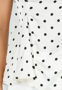 Witte Peplum Top met Zwarte Stippen en Ronde Hals