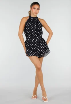 Zwarte Polkadot Playsuit met Halterhals en Volantlaag