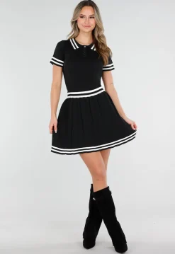 Zwarte Stretch Set met Polo Top en Plissé Rok