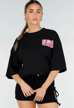 Zwart Oversized T-shirt met Roze Tekst en Korte Mouwen