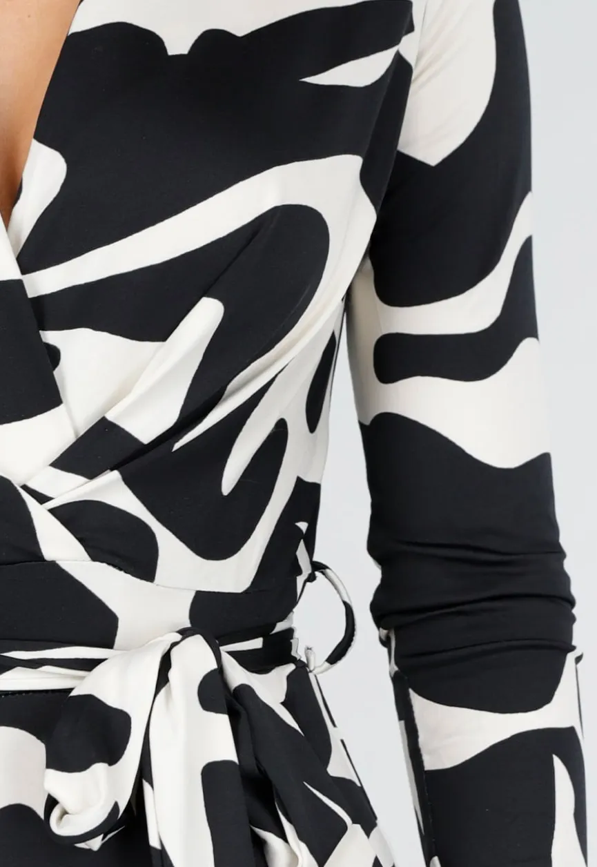 Zwart-Witte Stretch Jumpsuit met Print en Overslagtop